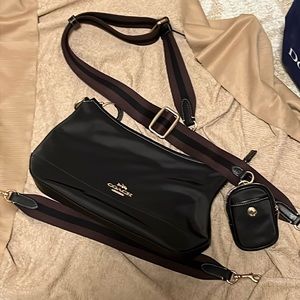 Coach nylon crossbody with Two straps.